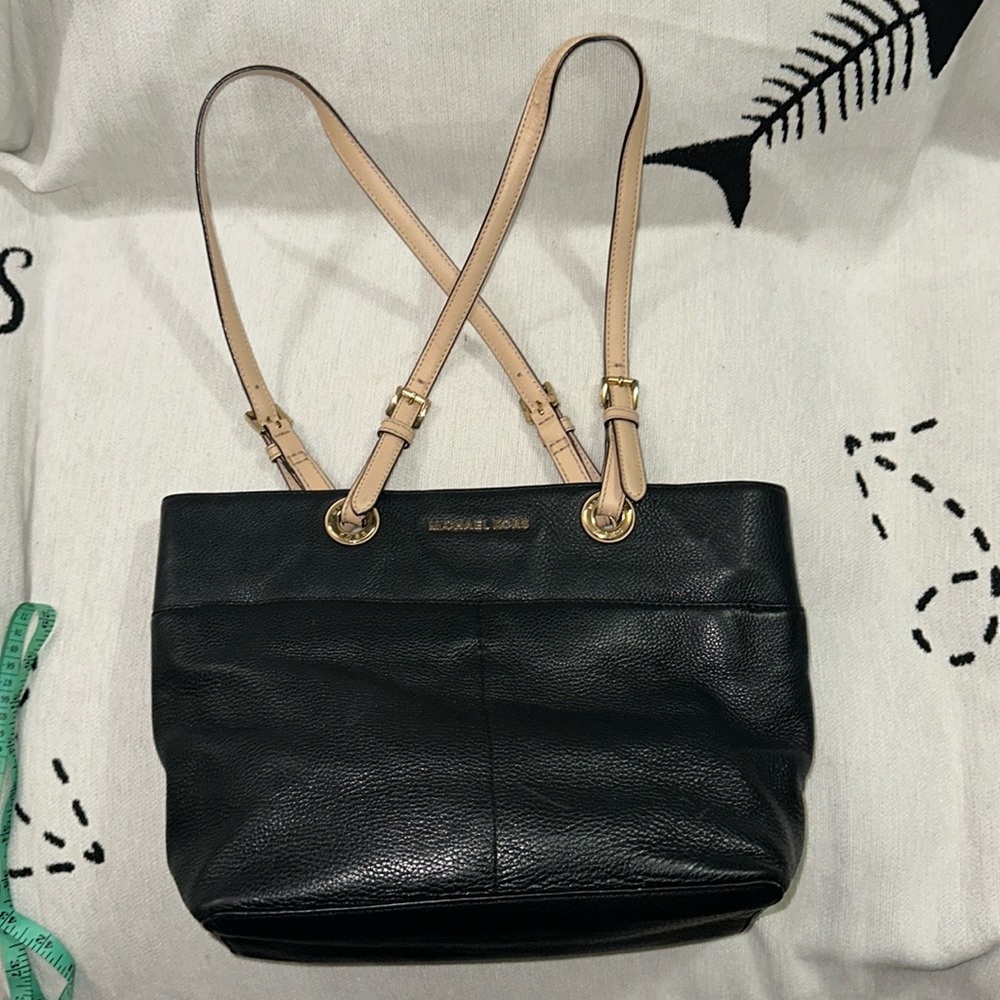 Michael Kors black pebble grain leather with gold hardware & tan double handles